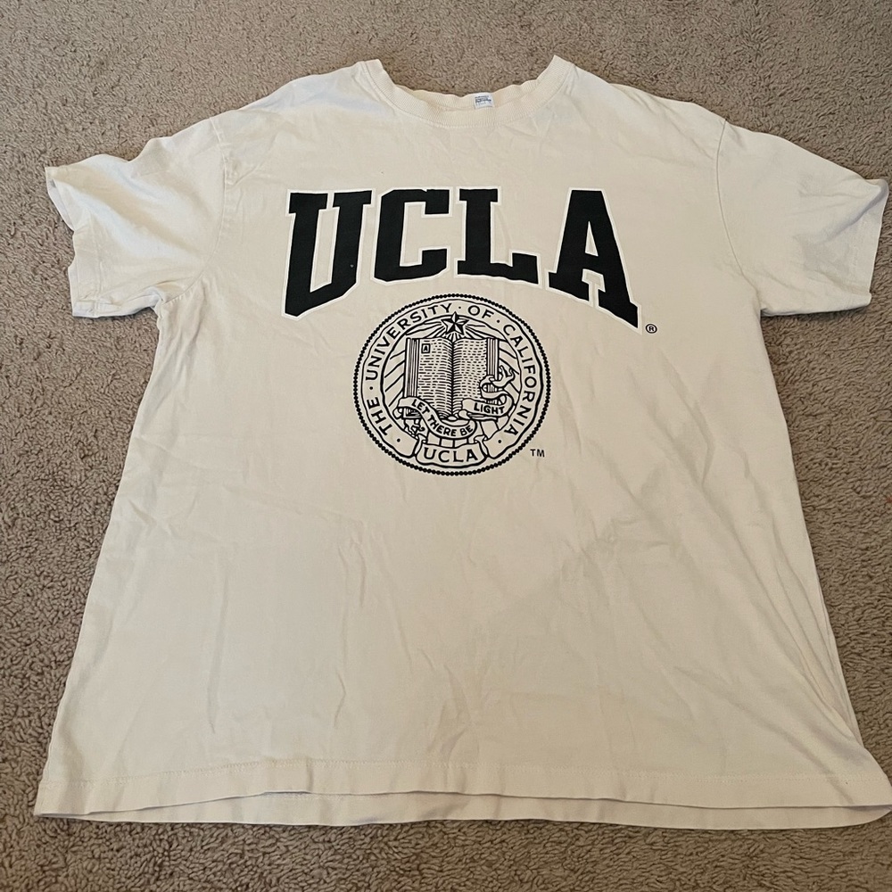 Oversized UCLA T-Shirt purchased from H&M that’s a size L and a beige color.